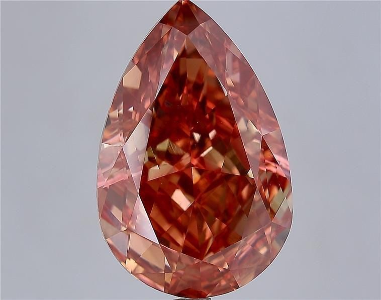 Loose Diamond - PEAR 10.08ct Fancy Vivid Orangey Pink VS1: Loose Diamond - PEAR 10.08ct Fancy Vivid Orangey Pink VS1 Source: This is a real non-mined Diamond that has been grown in a lab Shape: PEAR Carats: 10.08 Color: Fancy Vivid Orangey Pink Certification: