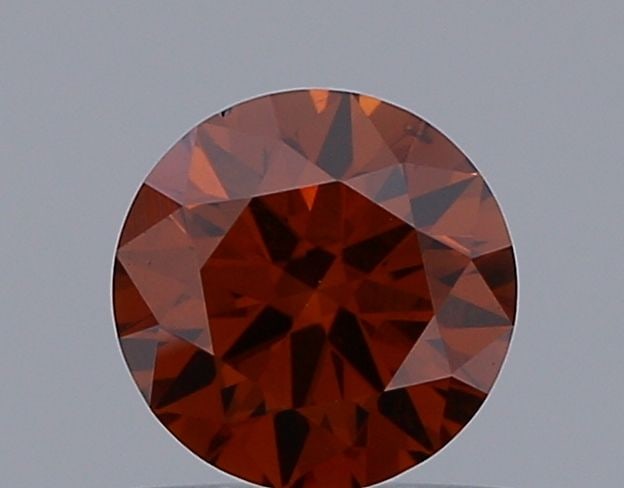 Ideal Loose Diamond - ROUND 0.69ct Fancy Deep Orange VS1: Ideal Loose Diamond - ROUND 0.69ct Fancy Deep Orange VS1 Source: This is a real non-mined Diamond that has been grown in a lab Shape: ROUND Carats: 0.69 Color: Fancy Deep Orange Certification: IGI Vid