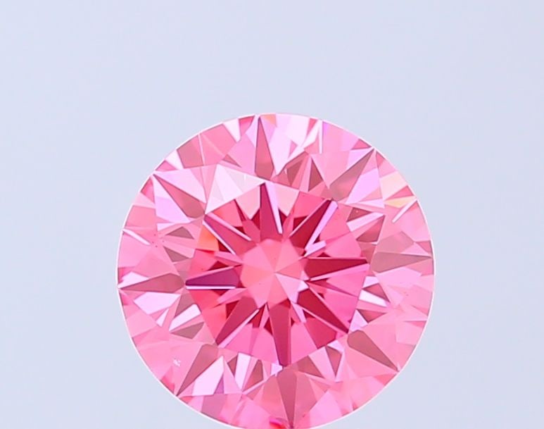 Ideal Loose Diamond - ROUND 2.01ct Fancy Vivid Pink VVS2: Ideal Loose Diamond - ROUND 2.01ct Fancy Vivid Pink VVS2 Source: This is a real non-mined Diamond that has been grown in a lab Shape: ROUND Carats: 2.01 Color: Fancy Vivid Pink Certification: IGI Vide