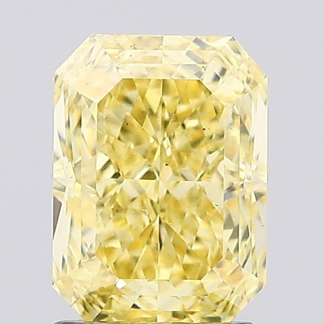 Loose Diamond - RADIANT 1.57ct Fancy Vivid Yellow VS2: Loose Diamond - RADIANT 1.57ct Fancy Vivid Yellow VS2 Source: This is a real non-mined Diamond that has been grown in a lab Shape: RADIANT Carats: 1.57 Color: Fancy Vivid Yellow Certification: IGI Vid