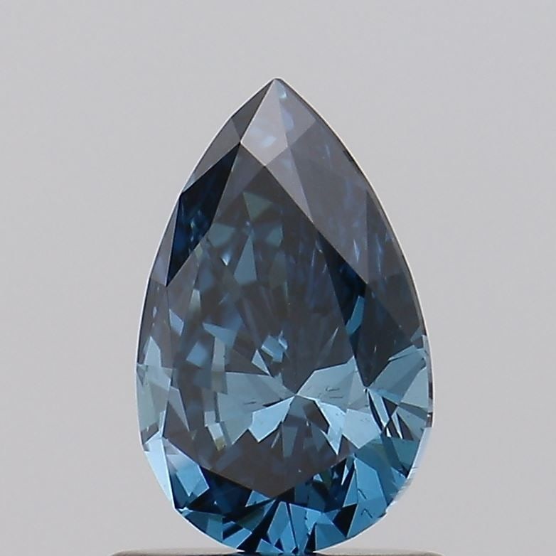 Loose Diamond - PEAR 0.79ct Fancy Vivid Greenish Blue VS2: Loose Diamond - PEAR 0.79ct Fancy Vivid Greenish Blue VS2 Source: This is a real non-mined Diamond that has been grown in a lab Shape: PEAR Carats: 0.79 Color: Fancy Vivid Greenish Blue Certification: