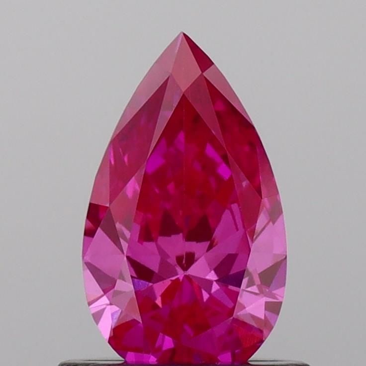 Loose Diamond - PEAR 0.68ct Fancy Vivid Pink VS1: Loose Diamond - PEAR 0.68ct Fancy Vivid Pink VS1 Source: This is a real non-mined Diamond that has been grown in a lab Shape: PEAR Carats: 0.68 Color: Fancy Vivid Pink Certification: IGI Video: