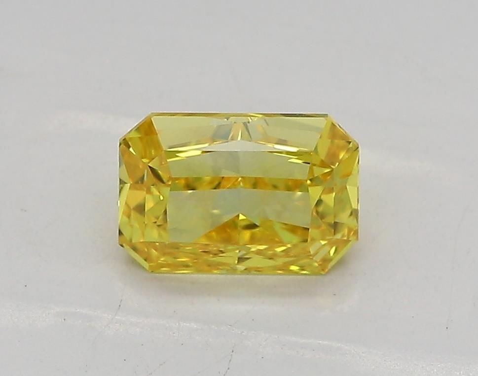 Loose Diamond - RADIANT 1.04ct Fancy Vivid Yellow VVS1: Loose Diamond - RADIANT 1.04ct Fancy Vivid Yellow VVS1 Source: This is a real non-mined Diamond that has been grown in a lab Shape: RADIANT Carats: 1.04 Color: Fancy Vivid Yellow Certification: IGI Vi