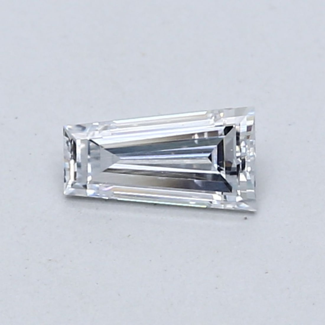 Loose Diamond - TAPERED BAGUETTE 0.37ct Fancy Light Blue VVS2: Loose Diamond - TAPERED BAGUETTE 0.37ct Fancy Light Blue VVS2 Source: This is a real non-mined Diamond that has been grown in a lab Shape: TAPERED BAGUETTE Carats: 0.37 Color: Fancy Light Blue Certifi