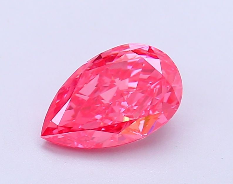 Loose Diamond - PEAR 1.35ct Fancy Vivid Pink VVS2: Loose Diamond - PEAR 1.35ct Fancy Vivid Pink VVS2 Source: This is a real non-mined Diamond that has been grown in a lab Shape: PEAR Carats: 1.35 Color: Fancy Vivid Pink Certification: IGI Video: