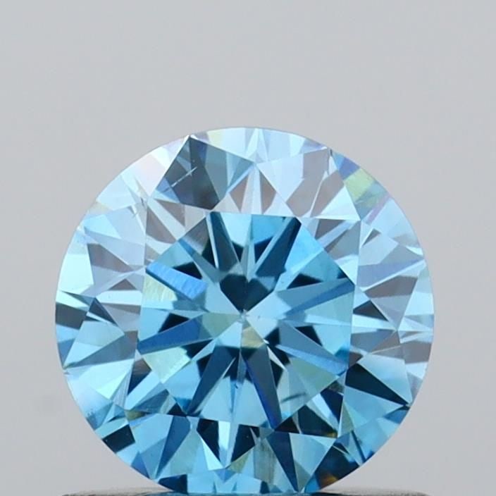 Loose Diamond - ROUND 0.71ct Fancy Vivid Blue VS2: Loose Diamond - ROUND 0.71ct Fancy Vivid Blue VS2 Source: This is a real non-mined Diamond that has been grown in a lab Shape: ROUND Carats: 0.71 Color: Fancy Vivid Blue Certification: IGI Video: