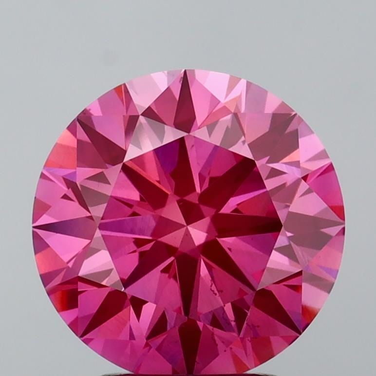 Ideal Loose Diamond - ROUND 3.06ct Fancy Vivid Pink VS2: Ideal Loose Diamond - ROUND 3.06ct Fancy Vivid Pink VS2 Source: This is a real non-mined Diamond that has been grown in a lab Shape: ROUND Carats: 3.06 Color: Fancy Vivid Pink Certification: IGI Video