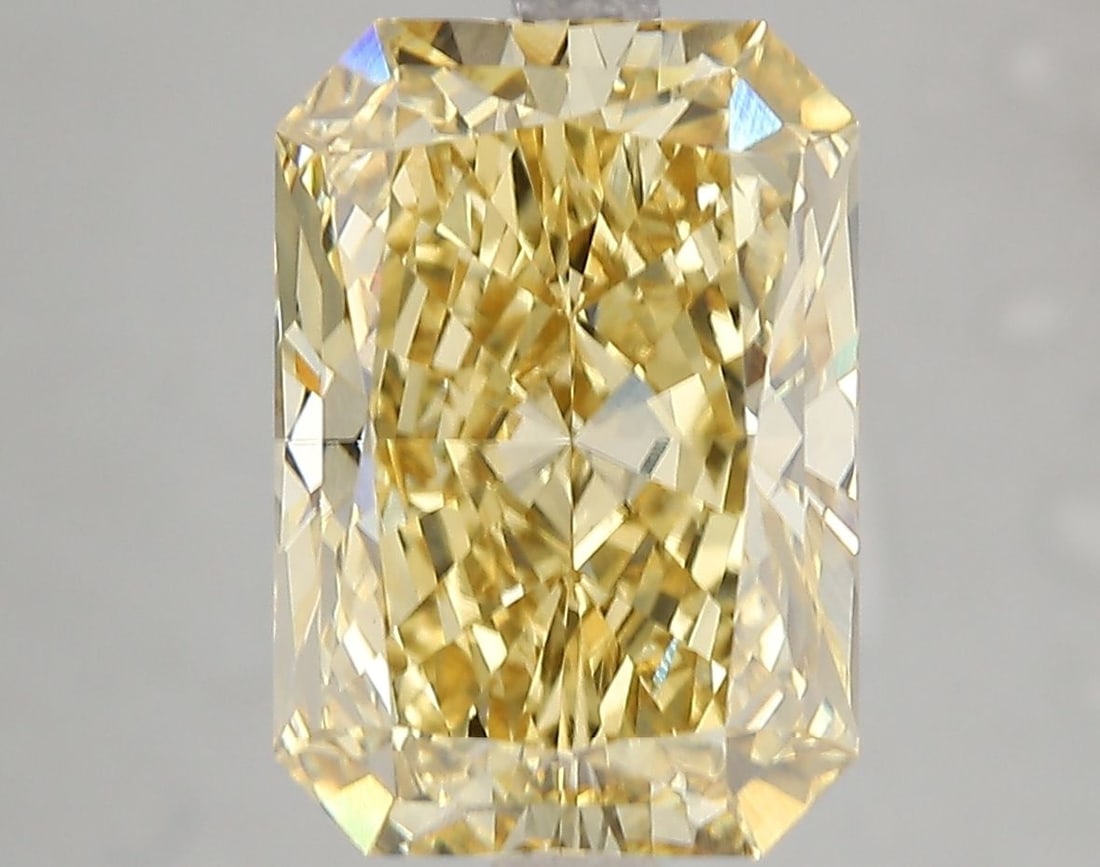 Loose Diamond - RADIANT 5.2ct Fancy Vivid Yellow VS1: Loose Diamond - RADIANT 5.2ct Fancy Vivid Yellow VS1 Source: This is a real non-mined Diamond that has been grown in a lab Shape: RADIANT Carats: 5.2 Color: Fancy Vivid Yellow Certification: IGI Video