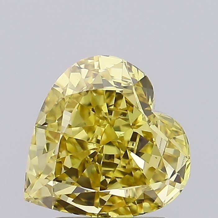 Loose Diamond - HEART 2.13ct Fancy Vivid Yellow VS1: Loose Diamond - HEART 2.13ct Fancy Vivid Yellow VS1 Source: This is a real non-mined Diamond that has been grown in a lab Shape: HEART Carats: 2.13 Color: Fancy Vivid Yellow Certification: IGI Video: