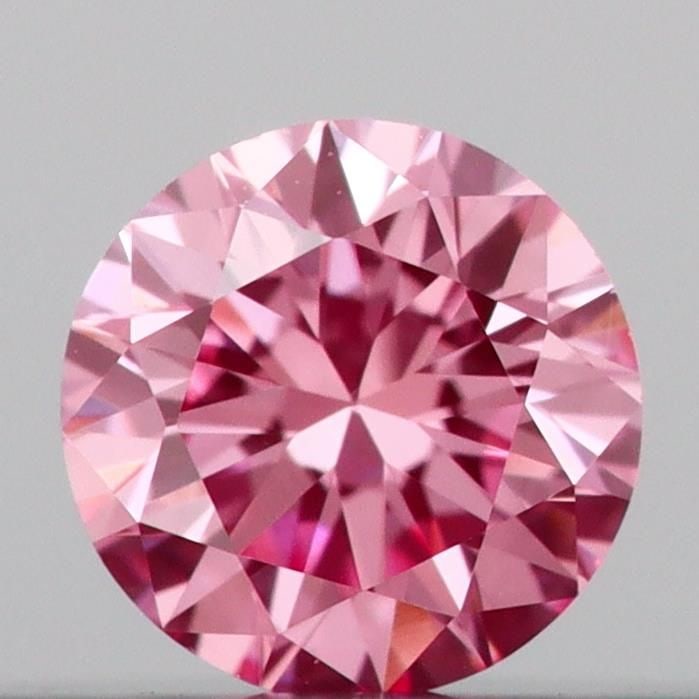 Loose Diamond - ROUND 0.14ct Fancy Vivid Pink VS1: Loose Diamond - ROUND 0.14ct Fancy Vivid Pink VS1 Source: This is a real non-mined Diamond that has been grown in a lab Shape: ROUND Carats: 0.14 Color: Fancy Vivid Pink Certification: IGI Video: