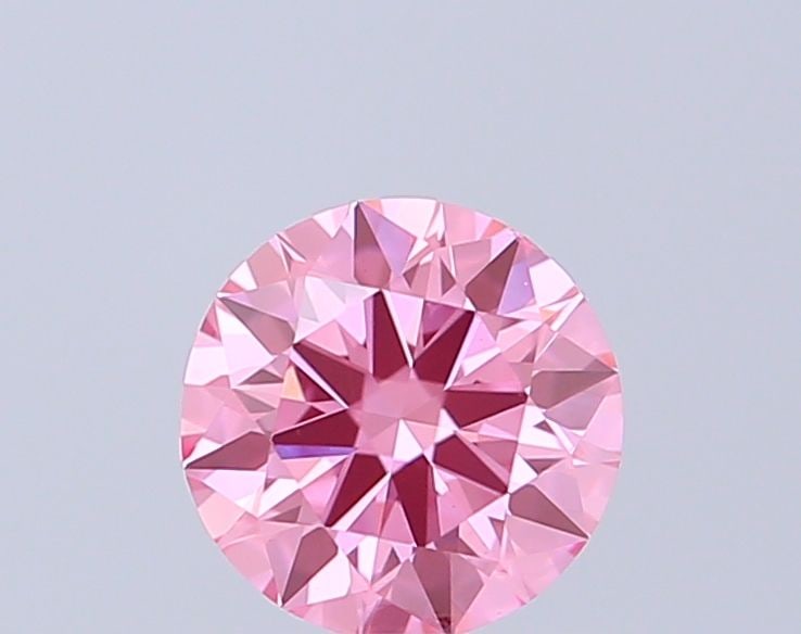 Ideal Loose Diamond - ROUND 0.58ct Fancy Vivid Pink VS1: Ideal Loose Diamond - ROUND 0.58ct Fancy Vivid Pink VS1 Source: This is a real non-mined Diamond that has been grown in a lab Shape: ROUND Carats: 0.58 Color: Fancy Vivid Pink Certification: IGI Video