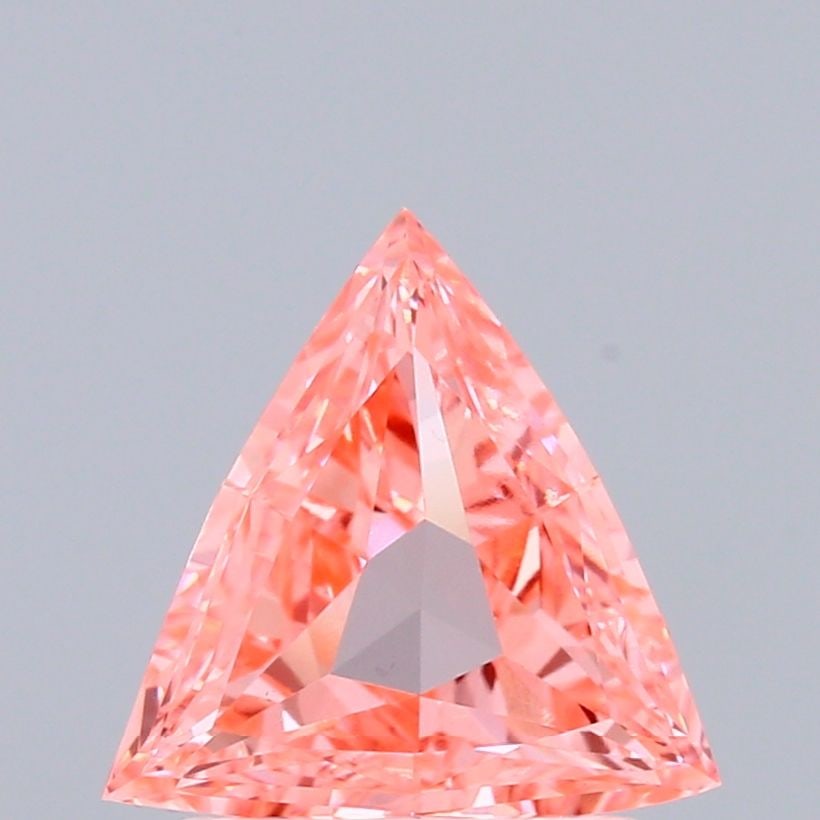 Loose Diamond - TRIANGULAR 0.86ct Fancy Vivid Pink VS1: Loose Diamond - TRIANGULAR 0.86ct Fancy Vivid Pink VS1 Source: This is a real non-mined Diamond that has been grown in a lab Shape: TRIANGULAR Carats: 0.86 Color: Fancy Vivid Pink Certification: IGI V