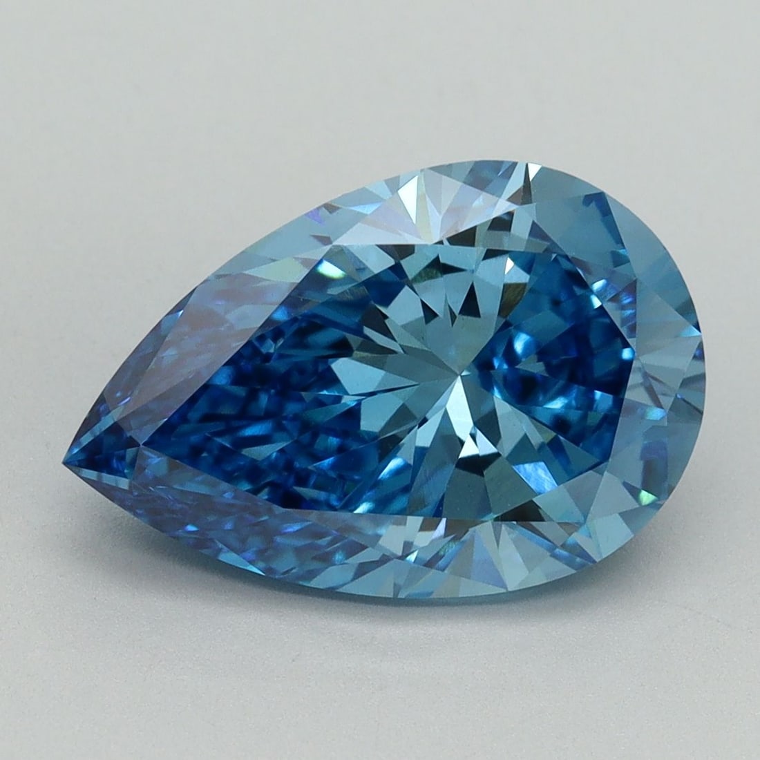Loose Diamond - PEAR 4.07ct Fancy Vivid Blue VVS2: Loose Diamond - PEAR 4.07ct Fancy Vivid Blue VVS2 Source: This is a real non-mined Diamond that has been grown in a lab Shape: PEAR Carats: 4.07 Color: Fancy Vivid Blue Certification: IGI Video: