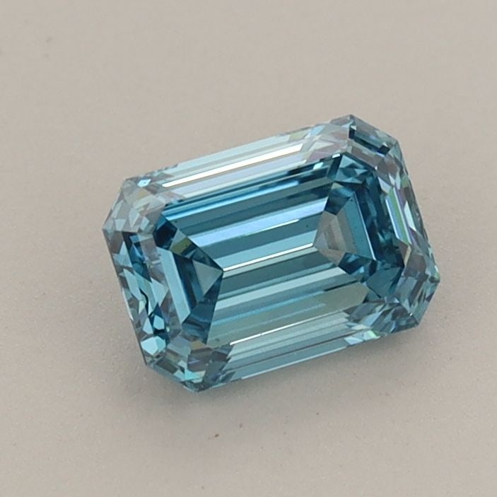 Loose Diamond - EMERALD 0.73ct Fancy Vivid Blue VS1: Loose Diamond - EMERALD 0.73ct Fancy Vivid Blue VS1 Source: This is a real non-mined Diamond that has been grown in a lab Shape: EMERALD Carats: 0.73 Color: Fancy Vivid Blue Certification: IGI The Dia