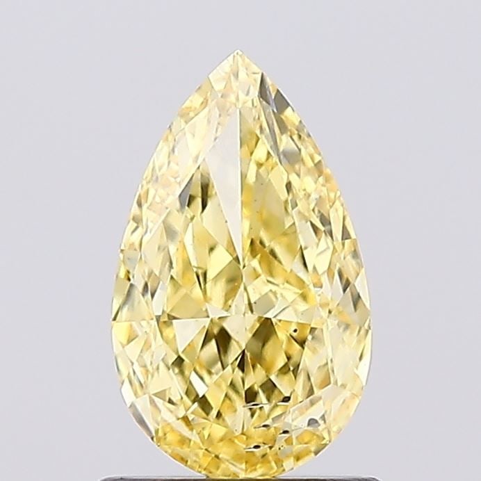 Loose Diamond - PEAR 1.01ct Fancy Vivid Yellow SI1: Loose Diamond - PEAR 1.01ct Fancy Vivid Yellow SI1 Source: This is a real non-mined Diamond that has been grown in a lab Shape: PEAR Carats: 1.01 Color: Fancy Vivid Yellow Certification: IGI Video: