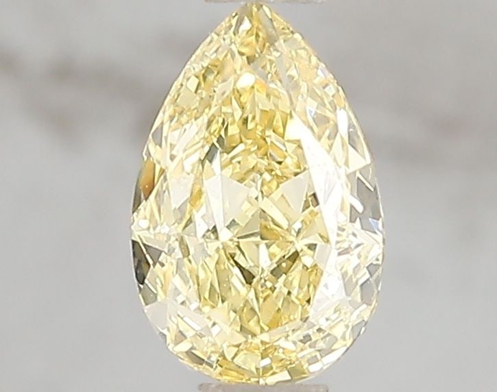 Loose Diamond - PEAR 1.06ct Fancy Intense Yellow VS1: Loose Diamond - PEAR 1.06ct Fancy Intense Yellow VS1 Source: This is a real non-mined Diamond that has been grown in a lab Shape: PEAR Carats: 1.06 Color: Fancy Intense Yellow Certification: IGI Video