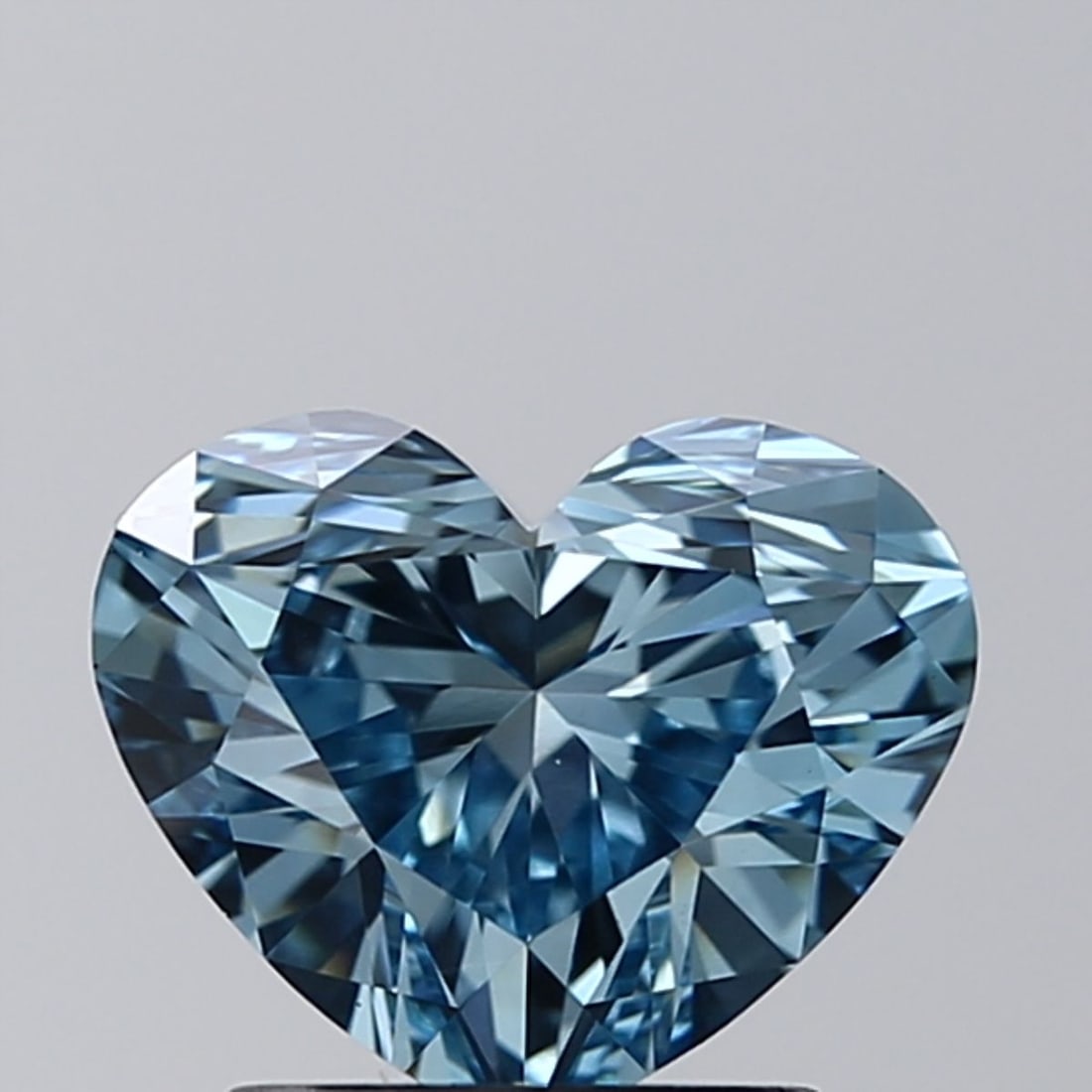 Loose Diamond - HEART 1.51ct Fancy Intense Blue VS1: Loose Diamond - HEART 1.51ct Fancy Intense Blue VS1 Source: This is a real non-mined Diamond that has been grown in a lab Shape: HEART Carats: 1.51 Color: Fancy Intense Blue Certification: IGI Video: