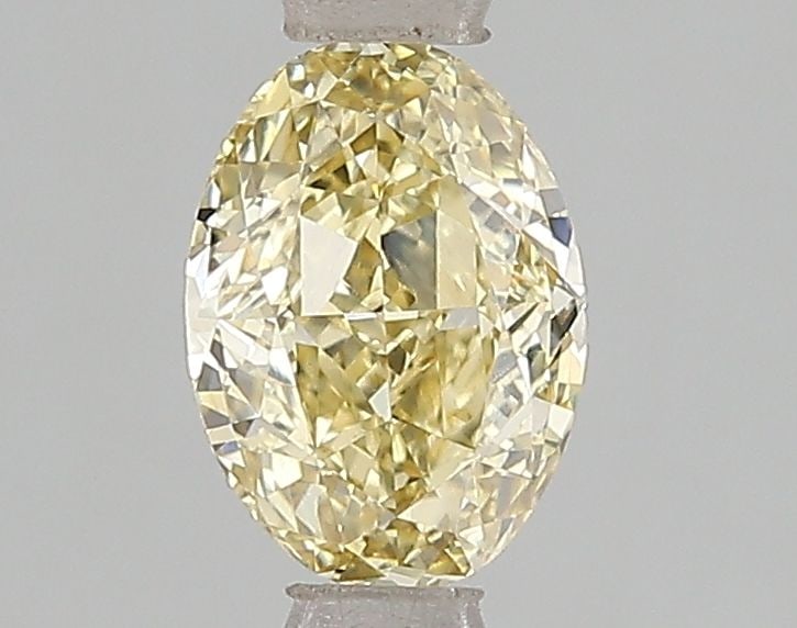 Loose Diamond - OVAL 1.01ct Fancy Intense Yellow VS1: Loose Diamond - OVAL 1.01ct Fancy Intense Yellow VS1 Source: This is a real non-mined Diamond that has been grown in a lab Shape: OVAL Carats: 1.01 Color: Fancy Intense Yellow Certification: IGI Video