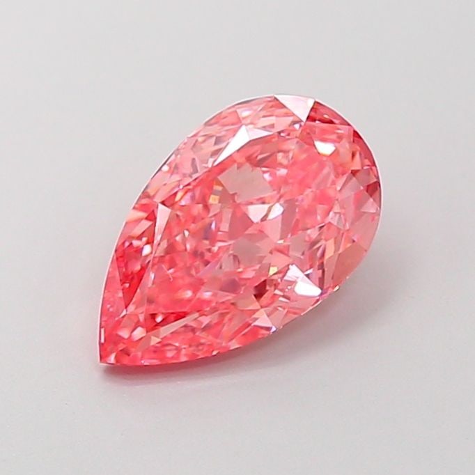 Loose Diamond - PEAR 1.73ct Fancy Vivid Pink VVS2: Loose Diamond - PEAR 1.73ct Fancy Vivid Pink VVS2 Source: This is a real non-mined Diamond that has been grown in a lab Shape: PEAR Carats: 1.73 Color: Fancy Vivid Pink Certification: IGI Video:
