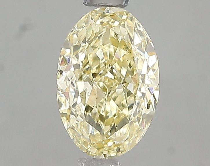 Loose Diamond - OVAL 1.03ct Fancy Intense Yellow VS2: Loose Diamond - OVAL 1.03ct Fancy Intense Yellow VS2 Source: This is a real non-mined Diamond that has been grown in a lab Shape: OVAL Carats: 1.03 Color: Fancy Intense Yellow Certification: IGI Video