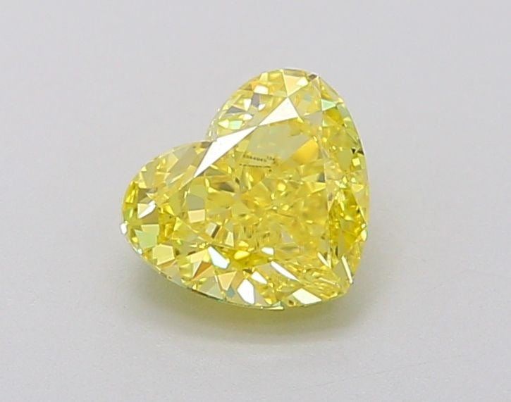 Loose Diamond - HEART 1.01ct Fancy Vivid Yellow VVS2: Loose Diamond - HEART 1.01ct Fancy Vivid Yellow VVS2 Source: This is a real non-mined Diamond that has been grown in a lab Shape: HEART Carats: 1.01 Color: Fancy Vivid Yellow Certification: IGI Video: