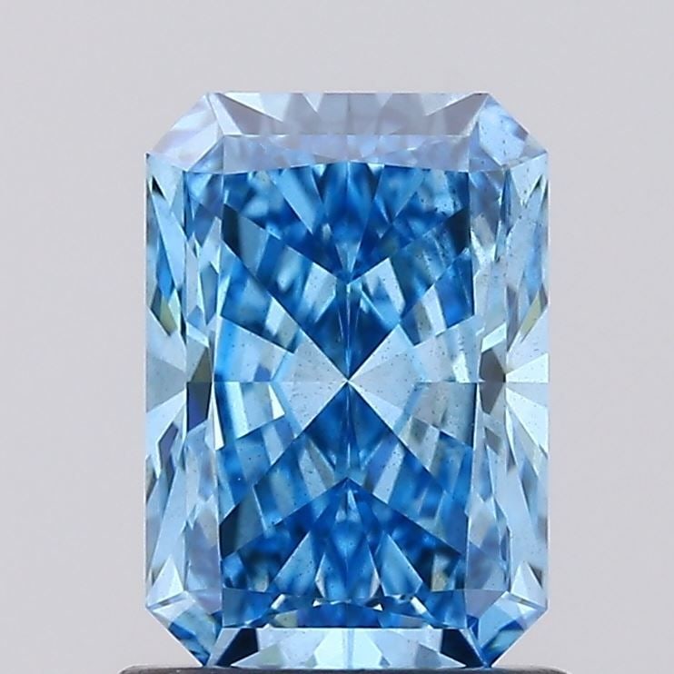 Loose Diamond - RADIANT 1.27ct Fancy Vivid Blue SI1: Loose Diamond - RADIANT 1.27ct Fancy Vivid Blue SI1 Source: This is a real non-mined Diamond that has been grown in a lab Shape: RADIANT Carats: 1.27 Color: Fancy Vivid Blue Certification: IGI Video: