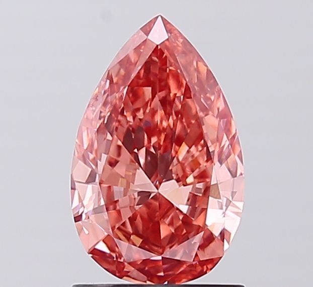 Loose Diamond - PEAR 1.07ct Fancy Vivid Orangey Pink VS2: Loose Diamond - PEAR 1.07ct Fancy Vivid Orangey Pink VS2 Source: This is a real non-mined Diamond that has been grown in a lab Shape: PEAR Carats: 1.07 Color: Fancy Vivid Orangey Pink Certification: I
