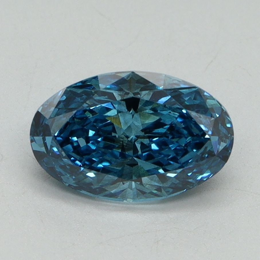 Loose Diamond - OVAL 1.51ct Fancy Vivid Blue VS2: Loose Diamond - OVAL 1.51ct Fancy Vivid Blue VS2 Source: This is a real non-mined Diamond that has been grown in a lab Shape: OVAL Carats: 1.51 Color: Fancy Vivid Blue Certification: IGI Video: