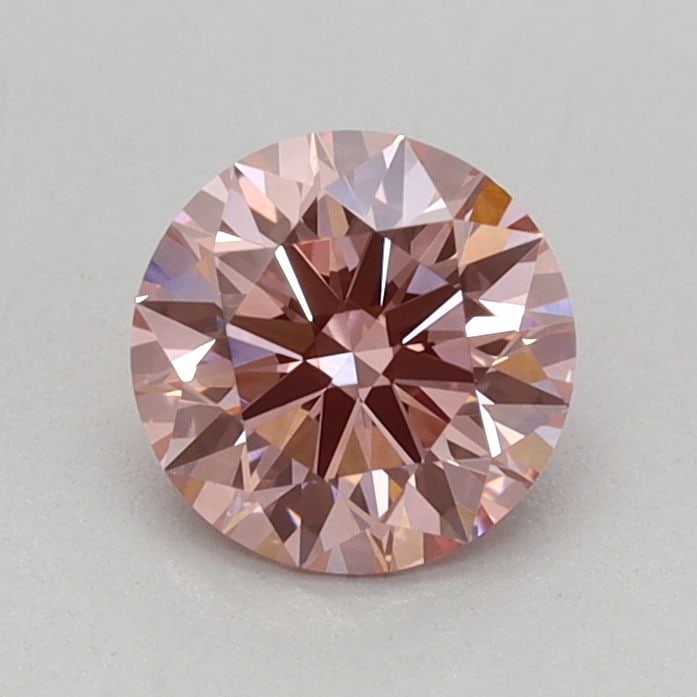 Ideal Loose Diamond - ROUND 0.55ct Fancy Vivid Pink VVS2: Ideal Loose Diamond - ROUND 0.55ct Fancy Vivid Pink VVS2 Source: This is a real non-mined Diamond that has been grown in a lab Shape: ROUND Carats: 0.55 Color: Fancy Vivid Pink Certification: IGI Vide