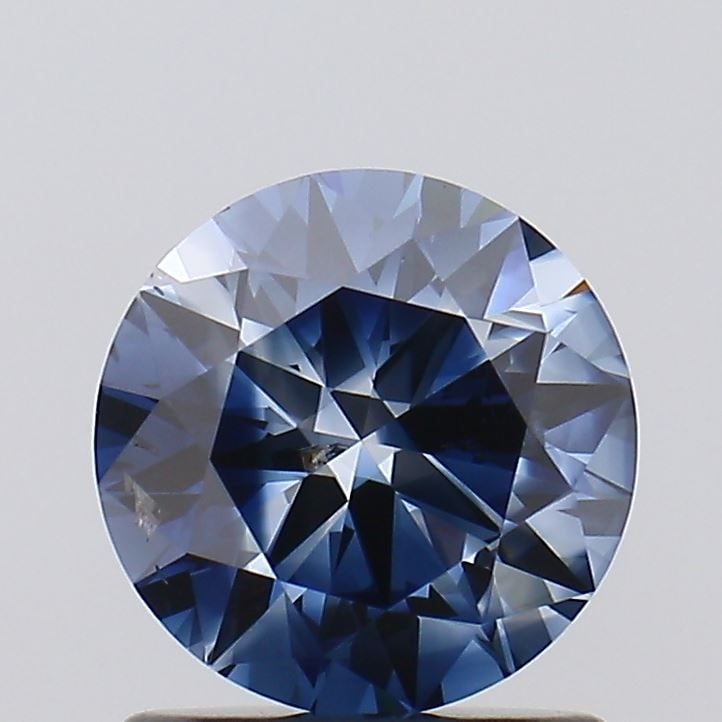 Loose Diamond - ROUND 1.11ct Fancy Vivid Blue I2: Loose Diamond - ROUND 1.11ct Fancy Vivid Blue I2 Source: This is a real non-mined Diamond that has been grown in a lab Shape: ROUND Carats: 1.11 Color: Fancy Vivid Blue Certification: NONE Video: