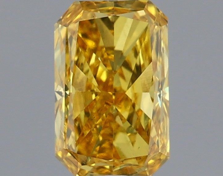 Loose Diamond - RADIANT 0.95ct Fancy Vivid Yellow VS2: Loose Diamond - RADIANT 0.95ct Fancy Vivid Yellow VS2 Source: This is a real non-mined Diamond that has been grown in a lab Shape: RADIANT Carats: 0.95 Color: Fancy Vivid Yellow Certification: IGI Vid