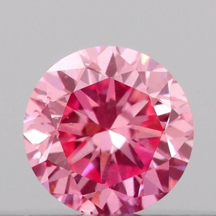 Loose Diamond - ROUND 0.13ct Fancy Vivid Pink SI1: Loose Diamond - ROUND 0.13ct Fancy Vivid Pink SI1 Source: This is a real non-mined Diamond that has been grown in a lab Shape: ROUND Carats: 0.13 Color: Fancy Vivid Pink Certification: IGI Video: