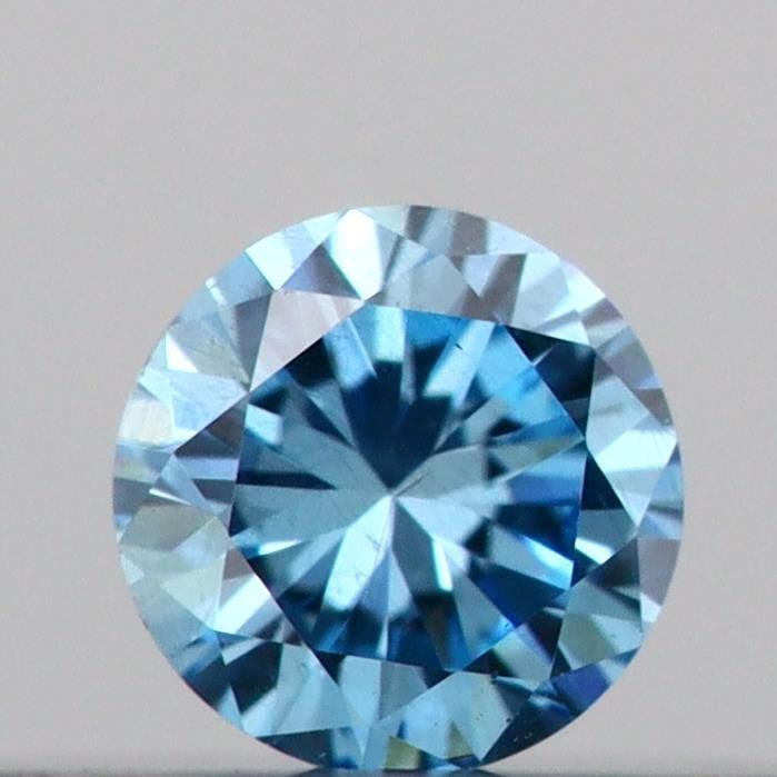 Loose Diamond - ROUND 0.09ct Fancy Vivid Blue SI1: Loose Diamond - ROUND 0.09ct Fancy Vivid Blue SI1 Source: This is a real non-mined Diamond that has been grown in a lab Shape: ROUND Carats: 0.09 Color: Fancy Vivid Blue Certification: IGI Video: