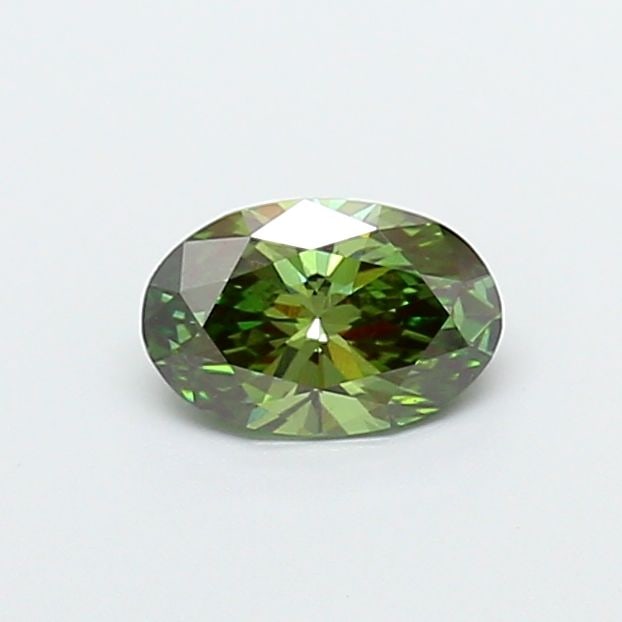 Loose Diamond - OVAL 0.89ct Fancy Vivid Green VVS2: Loose Diamond - OVAL 0.89ct Fancy Vivid Green VVS2 Source: This is a real non-mined Diamond that has been grown in a lab Shape: OVAL Carats: 0.89 Color: Fancy Vivid Green Certification: IGI Video: