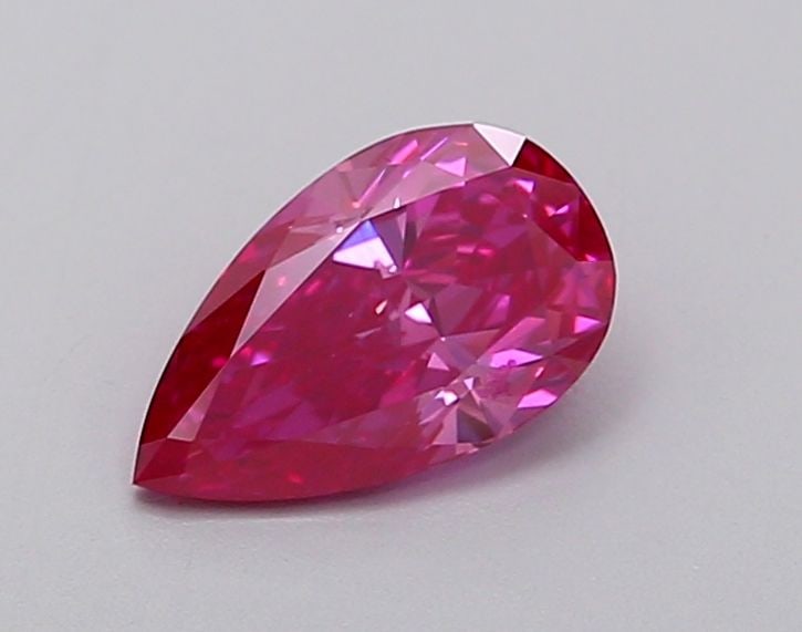 Loose Diamond - PEAR 0.72ct Fancy Vivid Pink VS1: Loose Diamond - PEAR 0.72ct Fancy Vivid Pink VS1 Source: This is a real non-mined Diamond that has been grown in a lab Shape: PEAR Carats: 0.72 Color: Fancy Vivid Pink Certification: IGI Video: