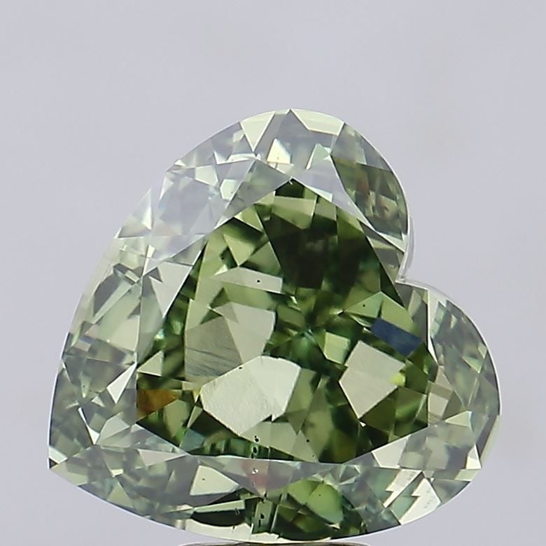 Loose Diamond - HEART 10.11ct Fancy Vivid Green VS2: Loose Diamond - HEART 10.11ct Fancy Vivid Green VS2 Source: This is a real non-mined Diamond that has been grown in a lab Shape: HEART Carats: 10.11 Color: Fancy Vivid Green Certification: IGI Video: