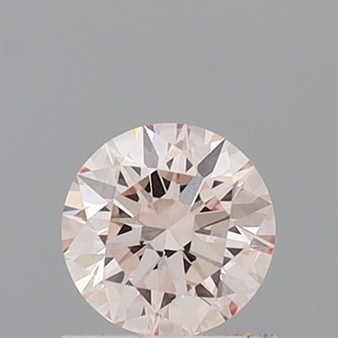 Ideal Loose Diamond - ROUND 0.75ct Fancy Light Pink VS1: Ideal Loose Diamond - ROUND 0.75ct Fancy Light Pink VS1 Source: This is a real non-mined Diamond that has been grown in a lab Shape: ROUND Carats: 0.75 Color: Fancy Light Pink Certification: IGI Video