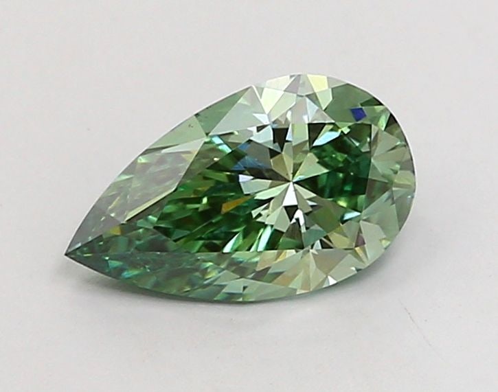 Loose Diamond - PEAR 0.99ct Fancy Vivid Green VS1: Loose Diamond - PEAR 0.99ct Fancy Vivid Green VS1 Source: This is a real non-mined Diamond that has been grown in a lab Shape: PEAR Carats: 0.99 Color: Fancy Vivid Green Certification: IGI Video: