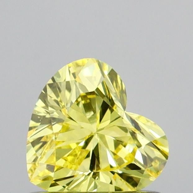 Loose Diamond - HEART 0.56ct Fancy Vivid Yellow VS2: Loose Diamond - HEART 0.56ct Fancy Vivid Yellow VS2 Source: This is a real non-mined Diamond that has been grown in a lab Shape: HEART Carats: 0.56 Color: Fancy Vivid Yellow Certification: IGI Video: