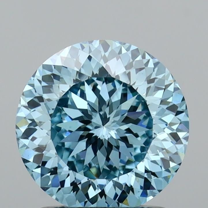 Loose Diamond - ROUND 1.54ct Fancy Vivid Blue VS1: Loose Diamond - ROUND 1.54ct Fancy Vivid Blue VS1 Source: This is a real non-mined Diamond that has been grown in a lab Shape: ROUND Carats: 1.54 Color: Fancy Vivid Blue Certification: IGI Video: