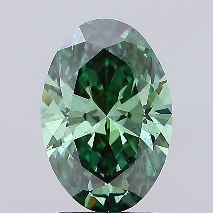 Loose Diamond - OVAL 2.2ct Fancy Vivid Green SI1: Loose Diamond - OVAL 2.2ct Fancy Vivid Green SI1 Source: This is a real non-mined Diamond that has been grown in a lab Shape: OVAL Carats: 2.2 Color: Fancy Vivid Green Certification: IGI Video: