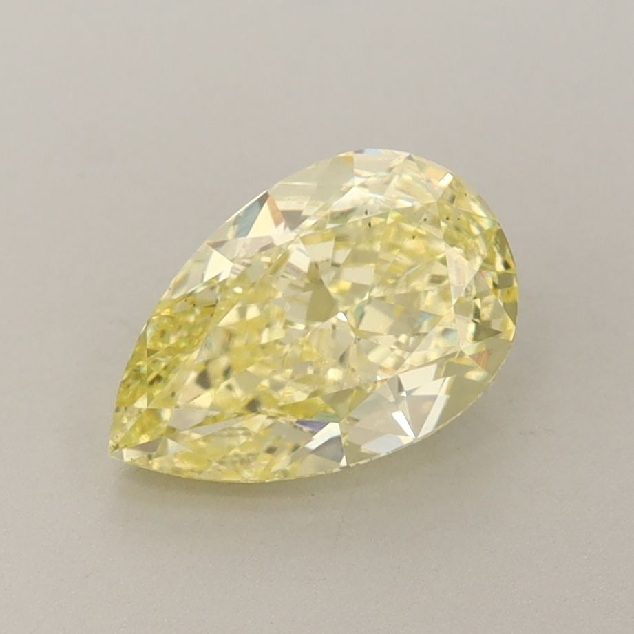 Loose Diamond - PEAR 1.52ct Fancy Vivid Yellow VS2: Loose Diamond - PEAR 1.52ct Fancy Vivid Yellow VS2 Source: This is a real non-mined Diamond that has been grown in a lab Shape: PEAR Carats: 1.52 Color: Fancy Vivid Yellow Certification: IGI Video: