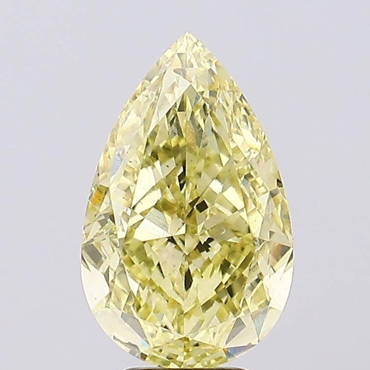 Loose Diamond - PEAR 6.52ct Fancy Vivid Yellow VS2: Loose Diamond - PEAR 6.52ct Fancy Vivid Yellow VS2 Source: This is a real non-mined Diamond that has been grown in a lab Shape: PEAR Carats: 6.52 Color: Fancy Vivid Yellow Certification: IGI Video: