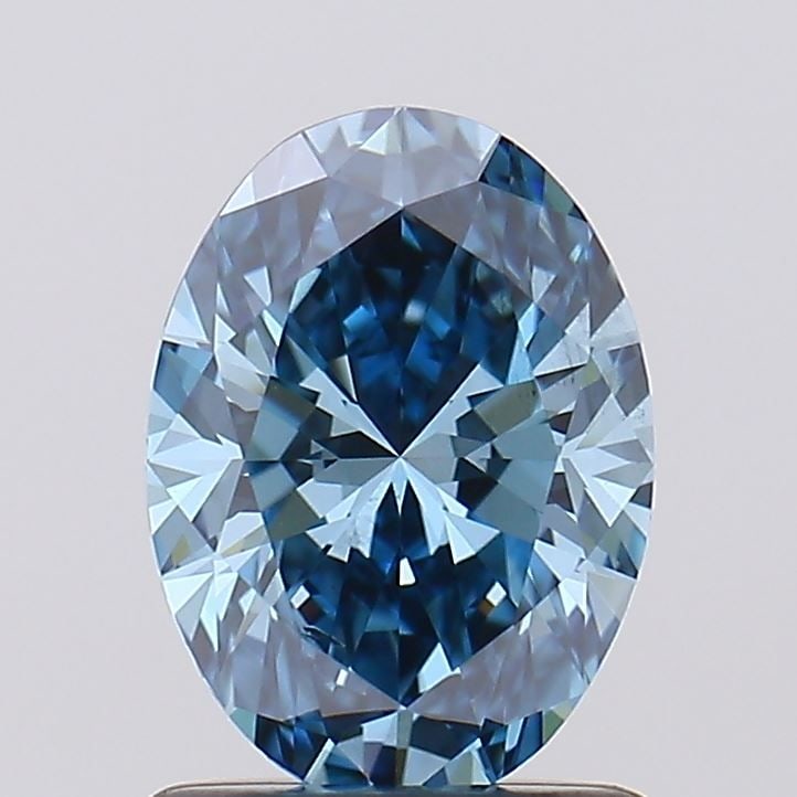 Loose Diamond - OVAL 1.0ct Fancy Vivid Blue VS2: Loose Diamond - OVAL 1.0ct Fancy Vivid Blue VS2 Source: This is a real non-mined Diamond that has been grown in a lab Shape: OVAL Carats: 1.0 Color: Fancy Vivid Blue Certification: IGI Video: