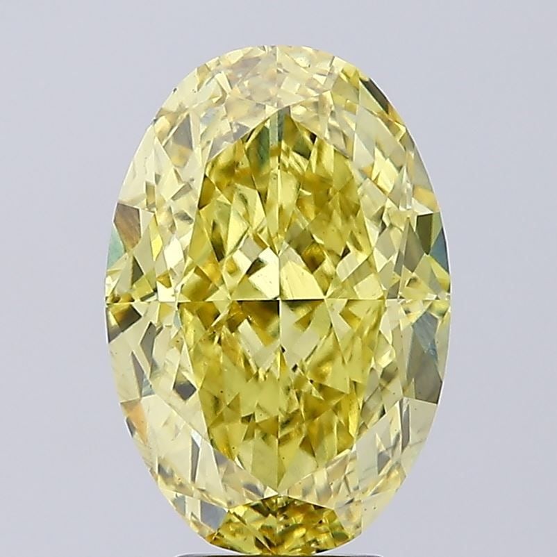 Loose Diamond - OVAL 7.1ct Fancy Vivid Yellow VS1: Loose Diamond - OVAL 7.1ct Fancy Vivid Yellow VS1 Source: This is a real non-mined Diamond that has been grown in a lab Shape: OVAL Carats: 7.1 Color: Fancy Vivid Yellow Certification: NONE Video: