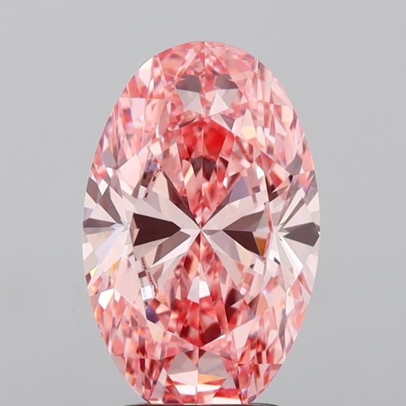 Loose Diamond - OVAL 3.07ct Fancy Vivid Pink VVS2: Loose Diamond - OVAL 3.07ct Fancy Vivid Pink VVS2 Source: This is a real non-mined Diamond that has been grown in a lab Shape: OVAL Carats: 3.07 Color: Fancy Vivid Pink Certification: IGI Video: