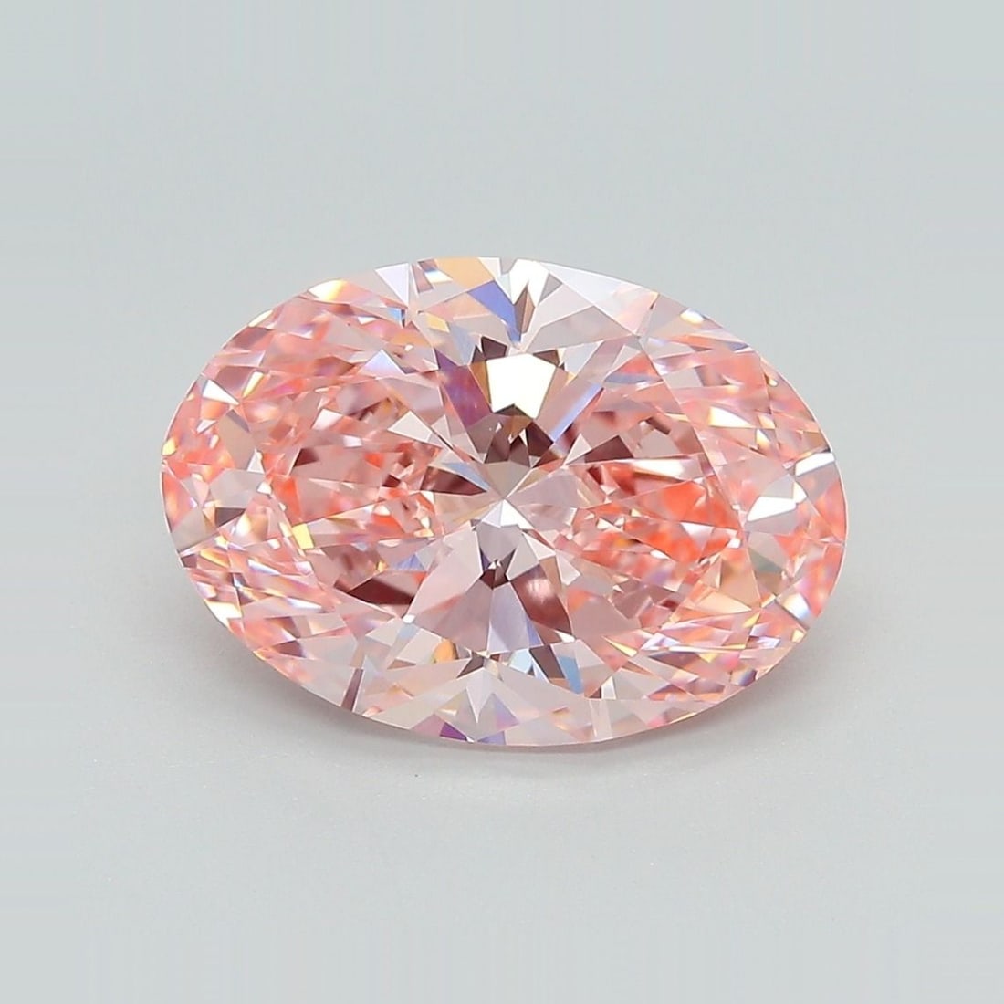 Loose Diamond - OVAL 4.49ct Fancy Vivid Pink VVS2: Loose Diamond - OVAL 4.49ct Fancy Vivid Pink VVS2 Source: This is a real non-mined Diamond that has been grown in a lab Shape: OVAL Carats: 4.49 Color: Fancy Vivid Pink Certification: IGI Video: