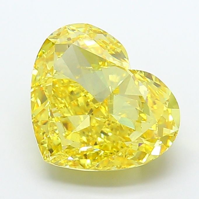 Loose Diamond - HEART 10.02ct Fancy Vivid Yellow VS2: Loose Diamond - HEART 10.02ct Fancy Vivid Yellow VS2 Source: This is a real non-mined Diamond that has been grown in a lab Shape: HEART Carats: 10.02 Color: Fancy Vivid Yellow Certification: IGI Video