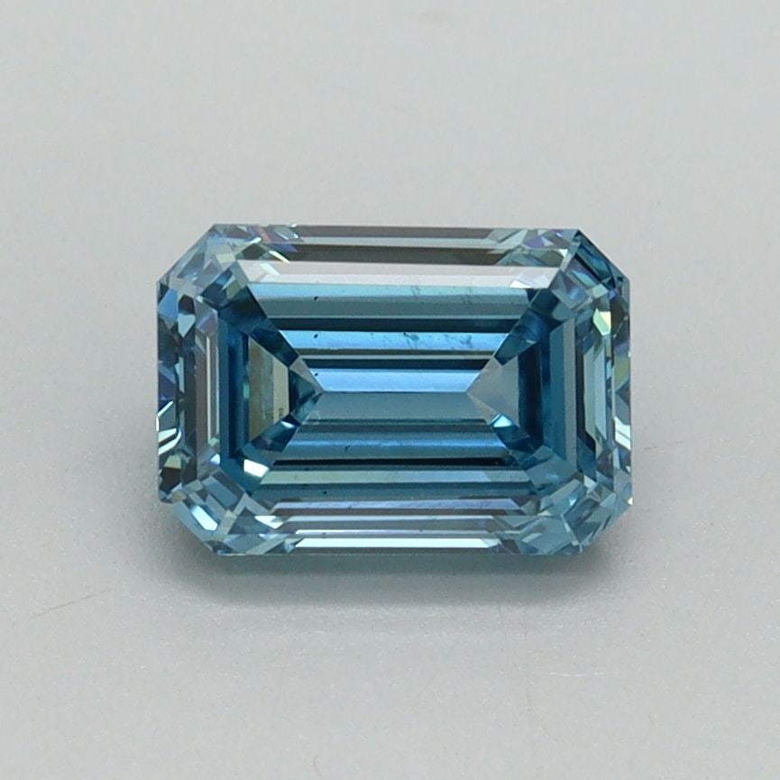 Loose Diamond - EMERALD 1.08ct Fancy Vivid Blue VS2: Loose Diamond - EMERALD 1.08ct Fancy Vivid Blue VS2 Source: This is a real non-mined Diamond that has been grown in a lab Shape: EMERALD Carats: 1.08 Color: Fancy Vivid Blue Certification: IGI Video: