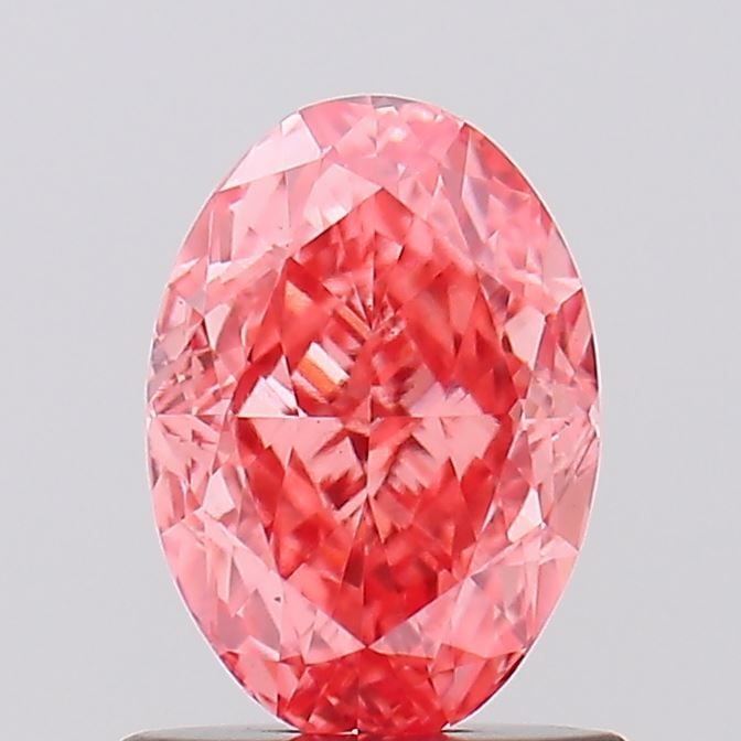 Loose Diamond - OVAL 1.01ct Fancy Vivid Pink VS1: Loose Diamond - OVAL 1.01ct Fancy Vivid Pink VS1 Source: This is a real non-mined Diamond that has been grown in a lab Shape: OVAL Carats: 1.01 Color: Fancy Vivid Pink Certification: IGI Video: